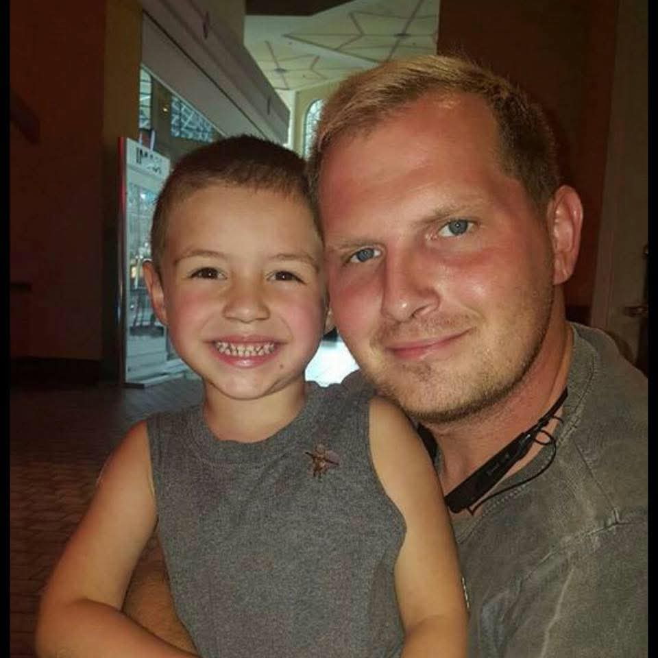 Joshua with his son as a young child